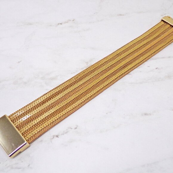 Wide gold chain bracelet with four rows of chain backed with a soft suede. - Picture 9 of 12